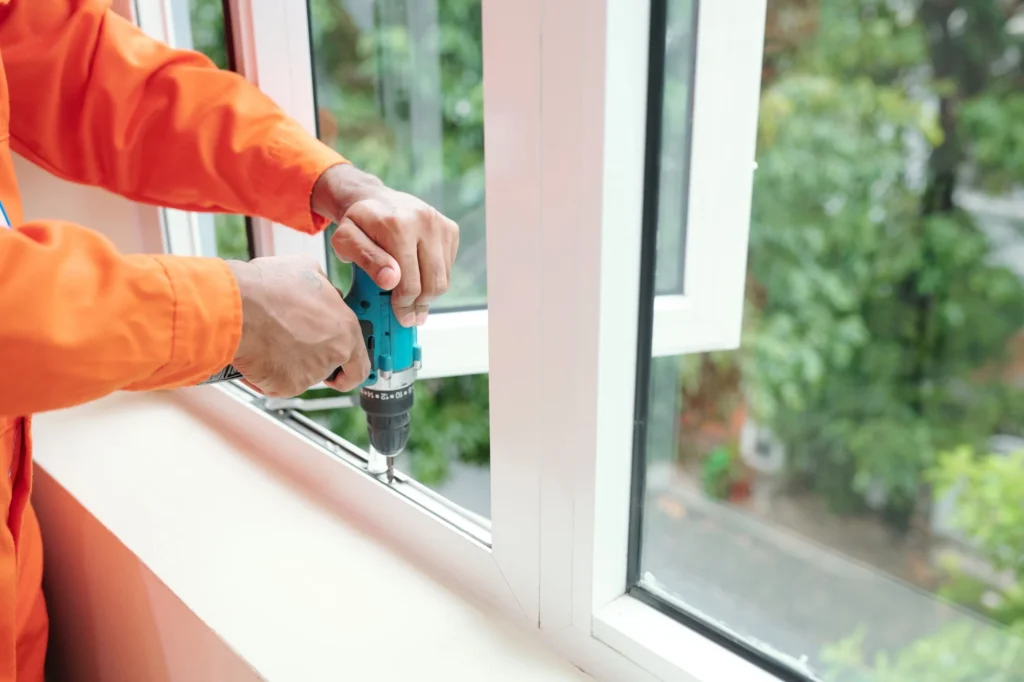 driving screws into jamb of plastic window